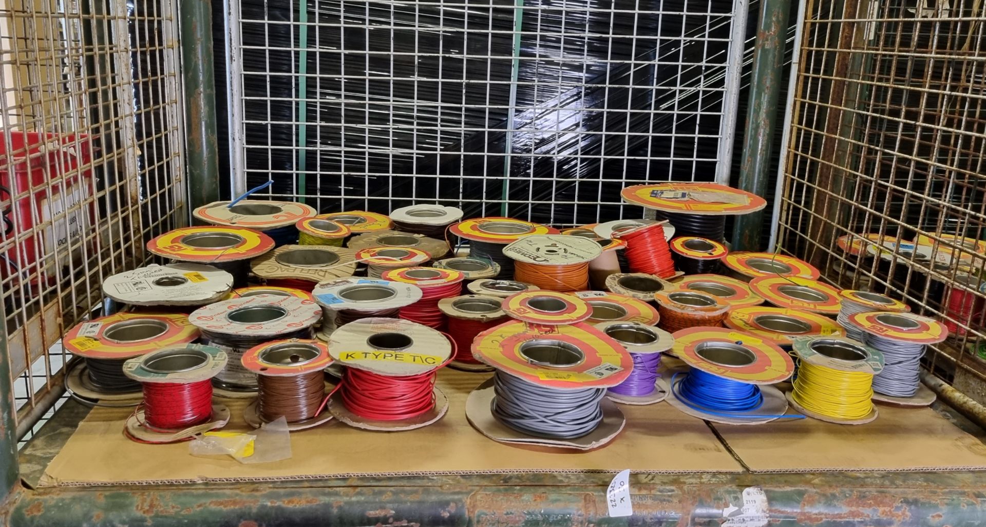Multiple reels of electrical cable of assorted lengths, types, colours and gauges