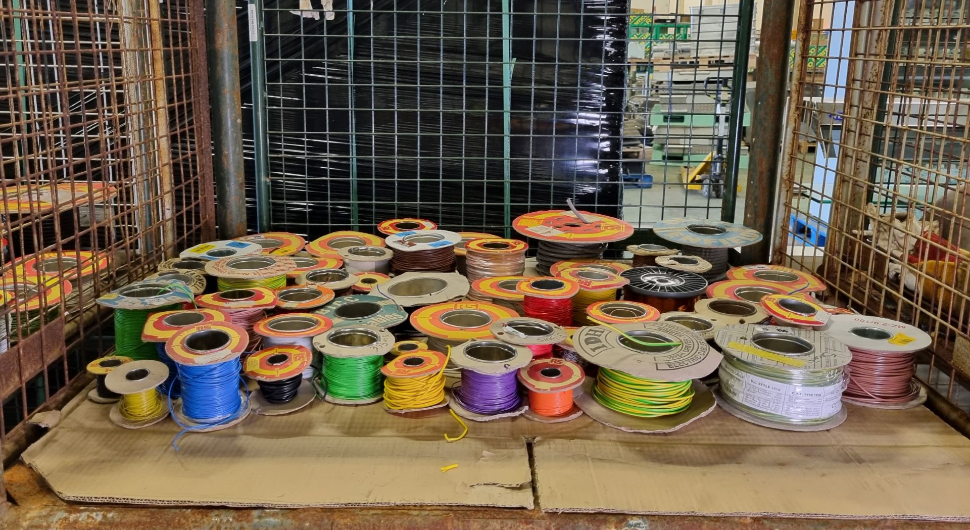 Multiple reels of electrical cable of assorted lengths, types, colours and gauges