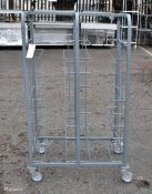 Brushed steel twin tray catering racking on wheels