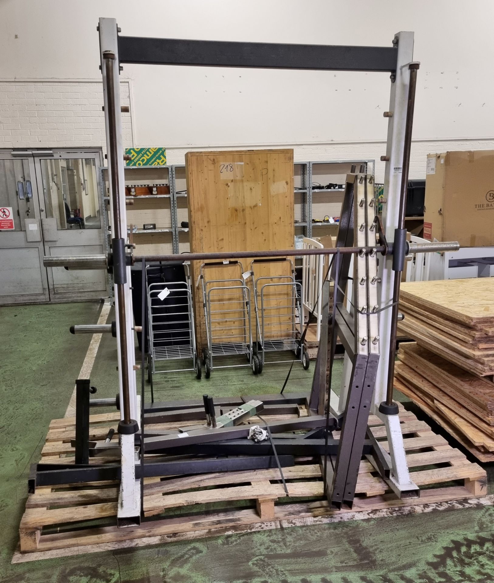 Power rack - unbranded (disassembled - sold as seen in pictures) & Smith machine