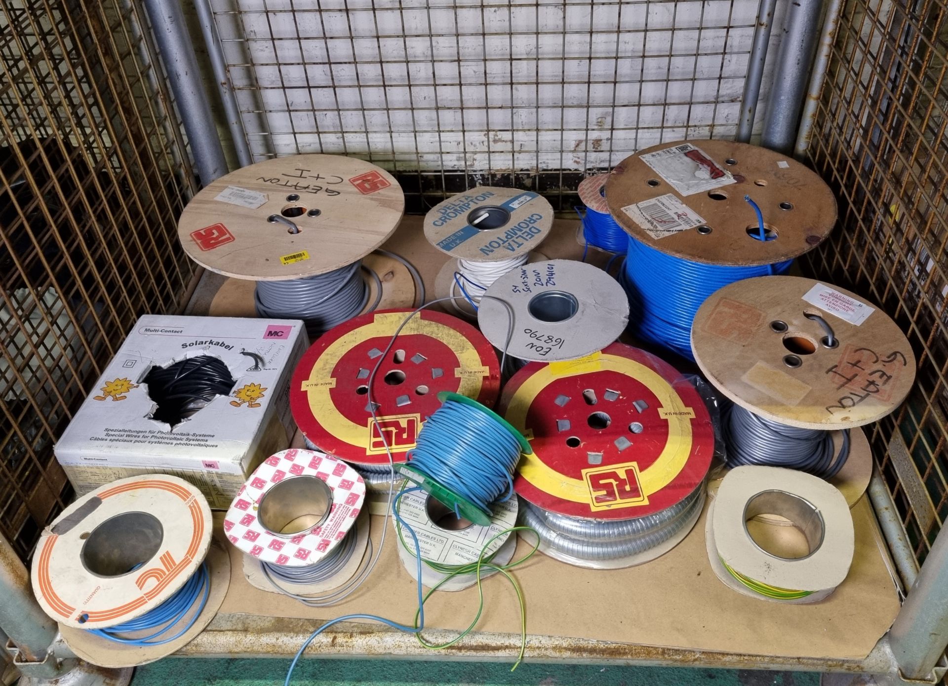 Multiple reels of electrical cable of assorted lengths, types, colours and gauges