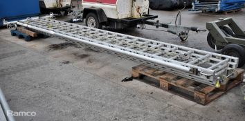Ex - Fire & Rescue rope-operated triple extension ladder with stabilising support poles