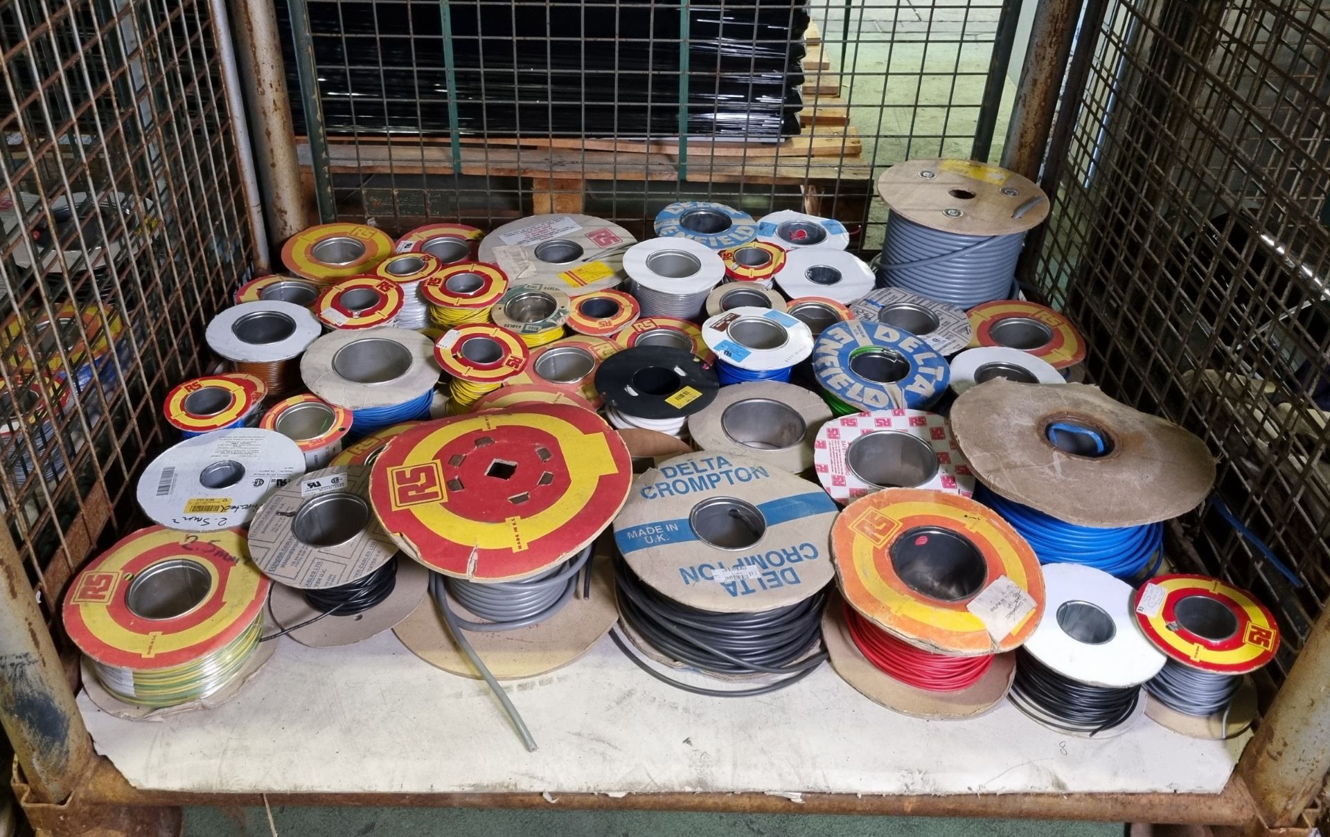 Multiple reels of electrical cable of assorted lengths, types, colours and gauges