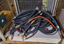 Various sized black hydraulic hoses