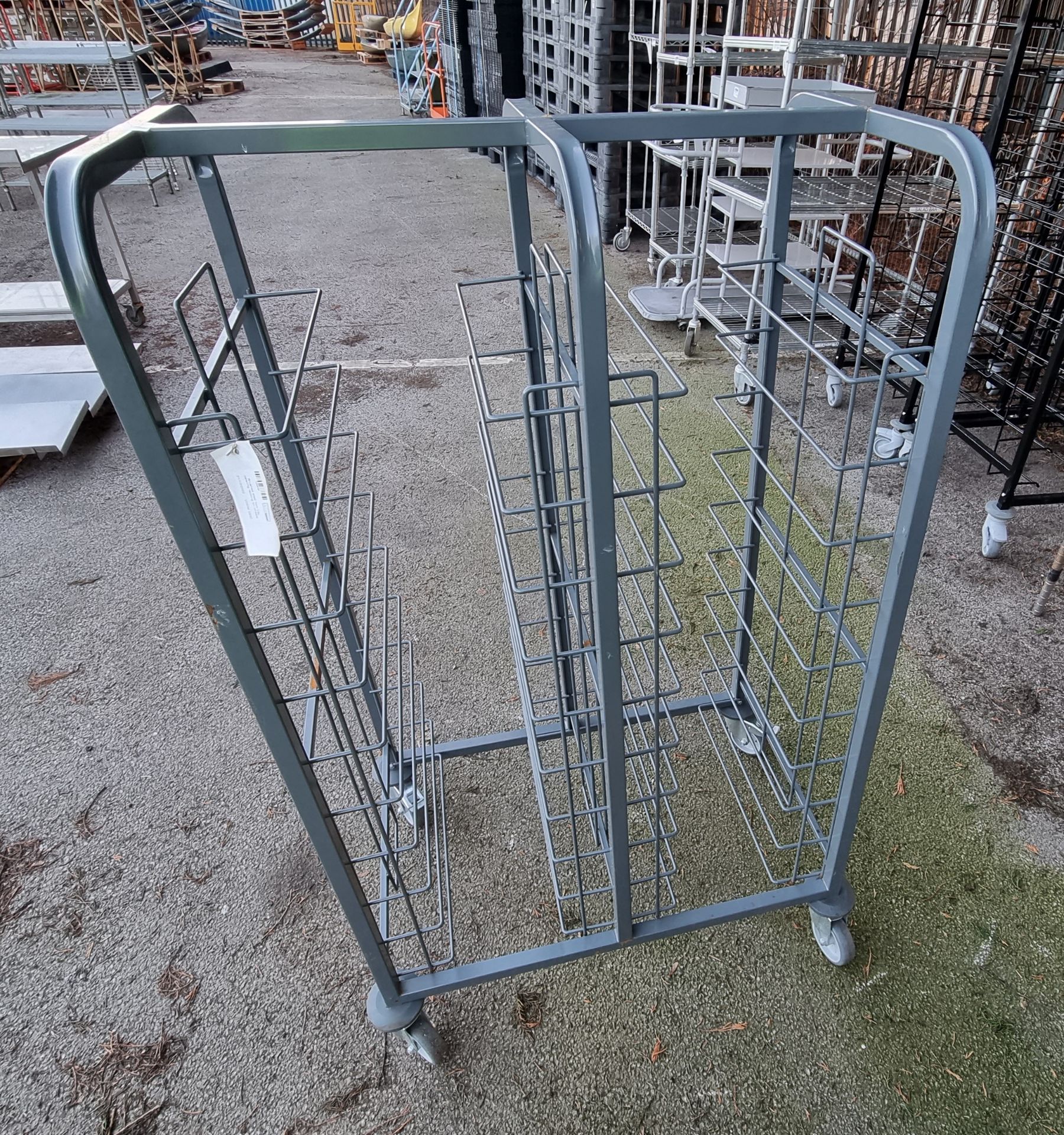 Brushed steel twin tray catering racking on wheels