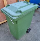 Kilko green plastic wheelie bin - dimensions: 85x60x110cm