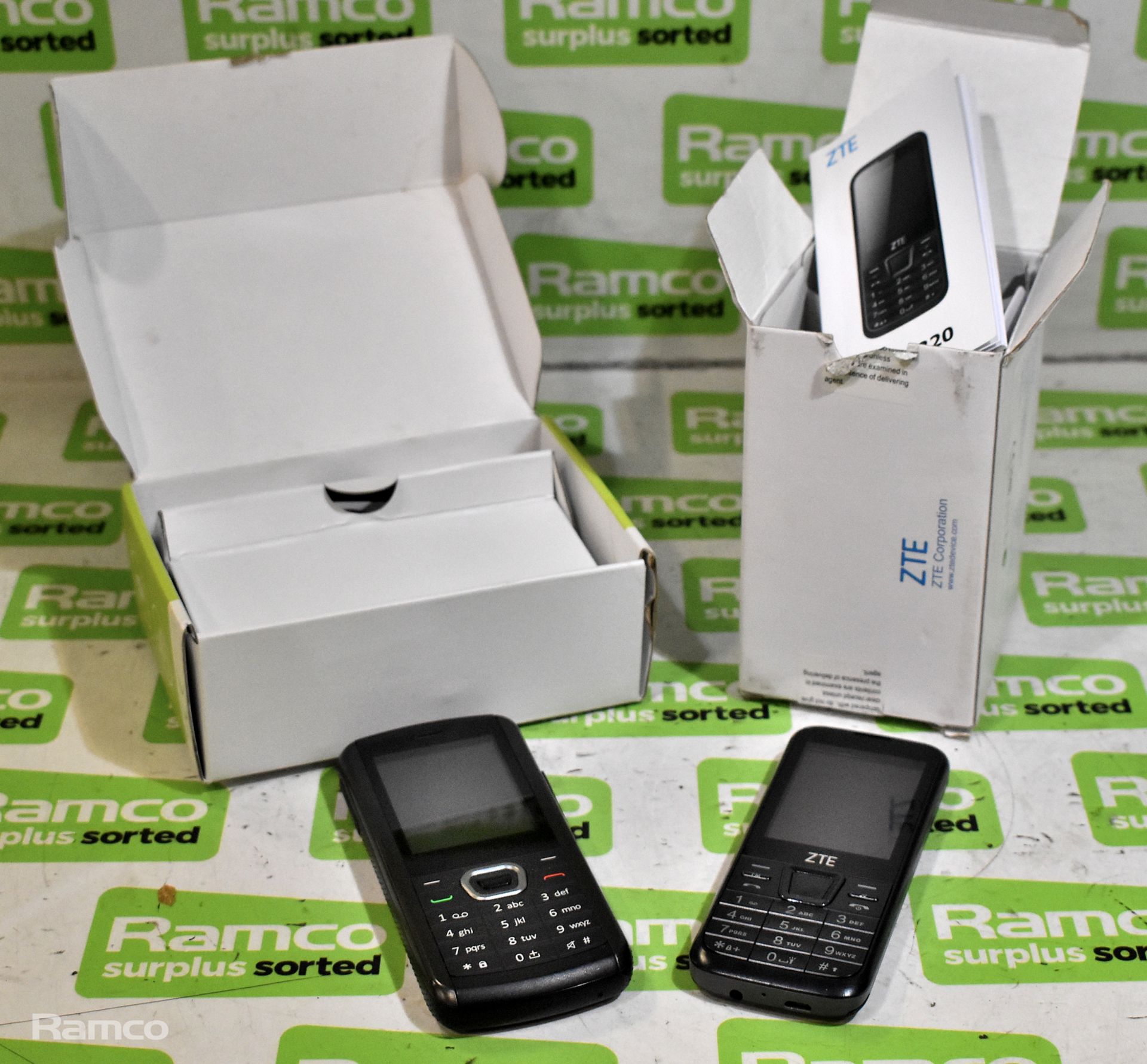 ZTE F320 mobile phone in box, Mobiwire Dakota mobile phone in box