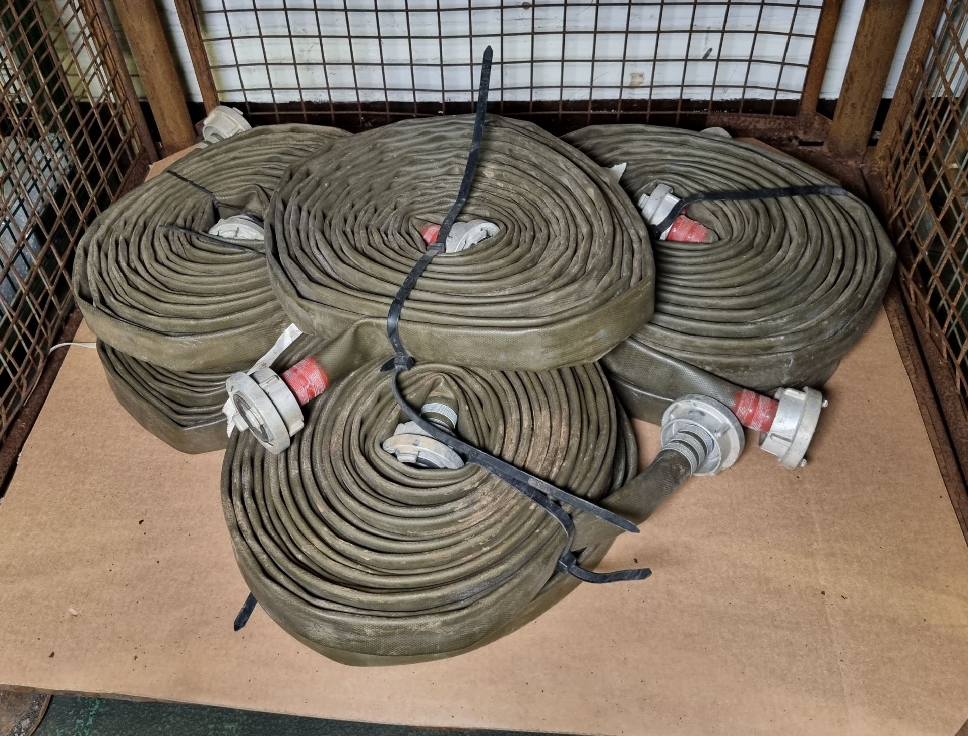 7x Layflat green hose with PVR-1/89 couplings - approx length: 20m, approx diameter: 45mm
