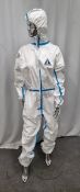 24x pallets of coveralls - size M - est. total qty 19200 - location NN18 8JY