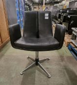 Black padded swivel chair