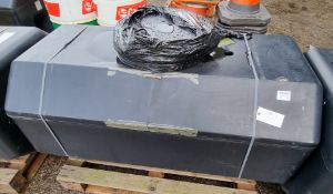 Plastic water tank with hoses and accessories