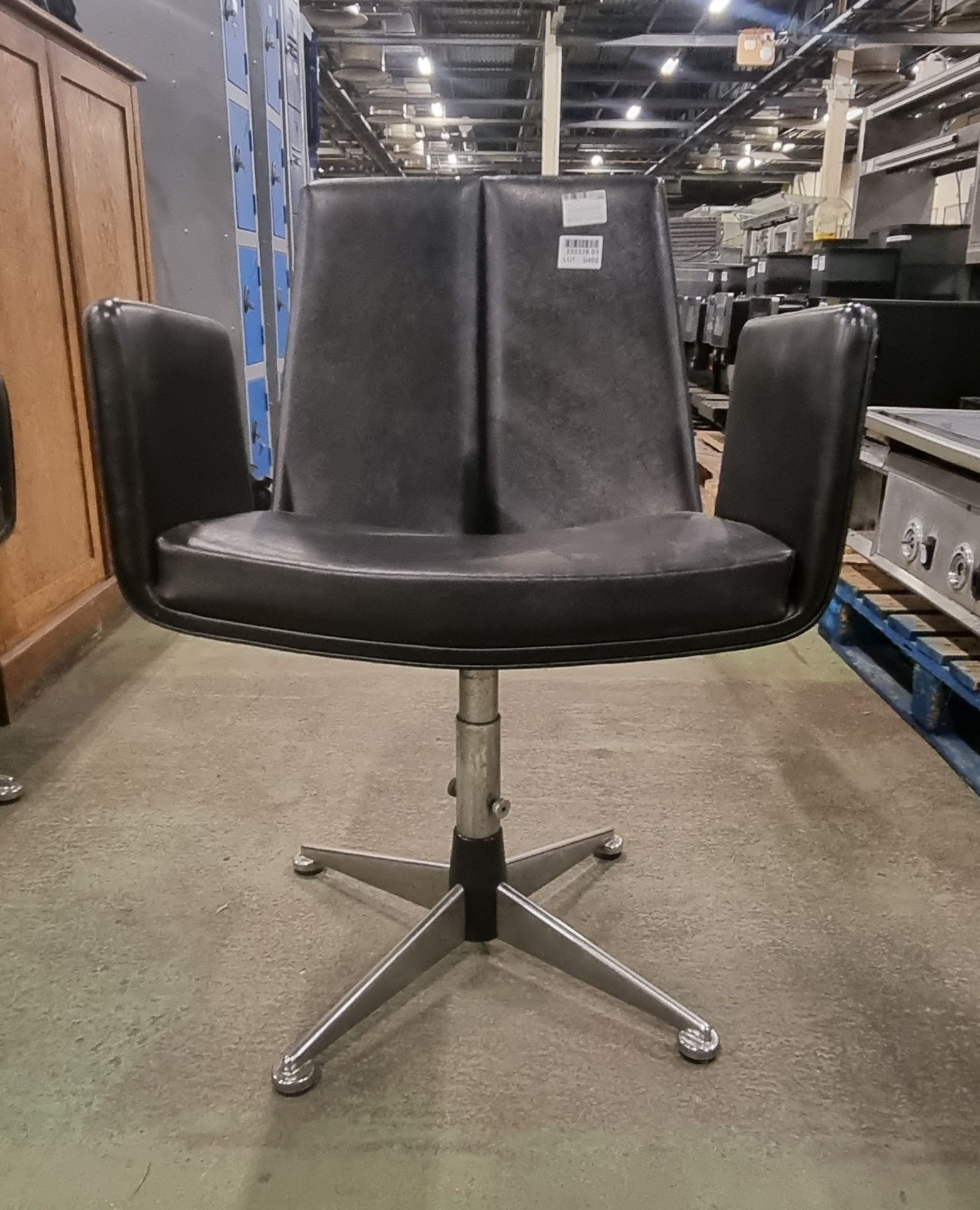 Black padded swivel chair