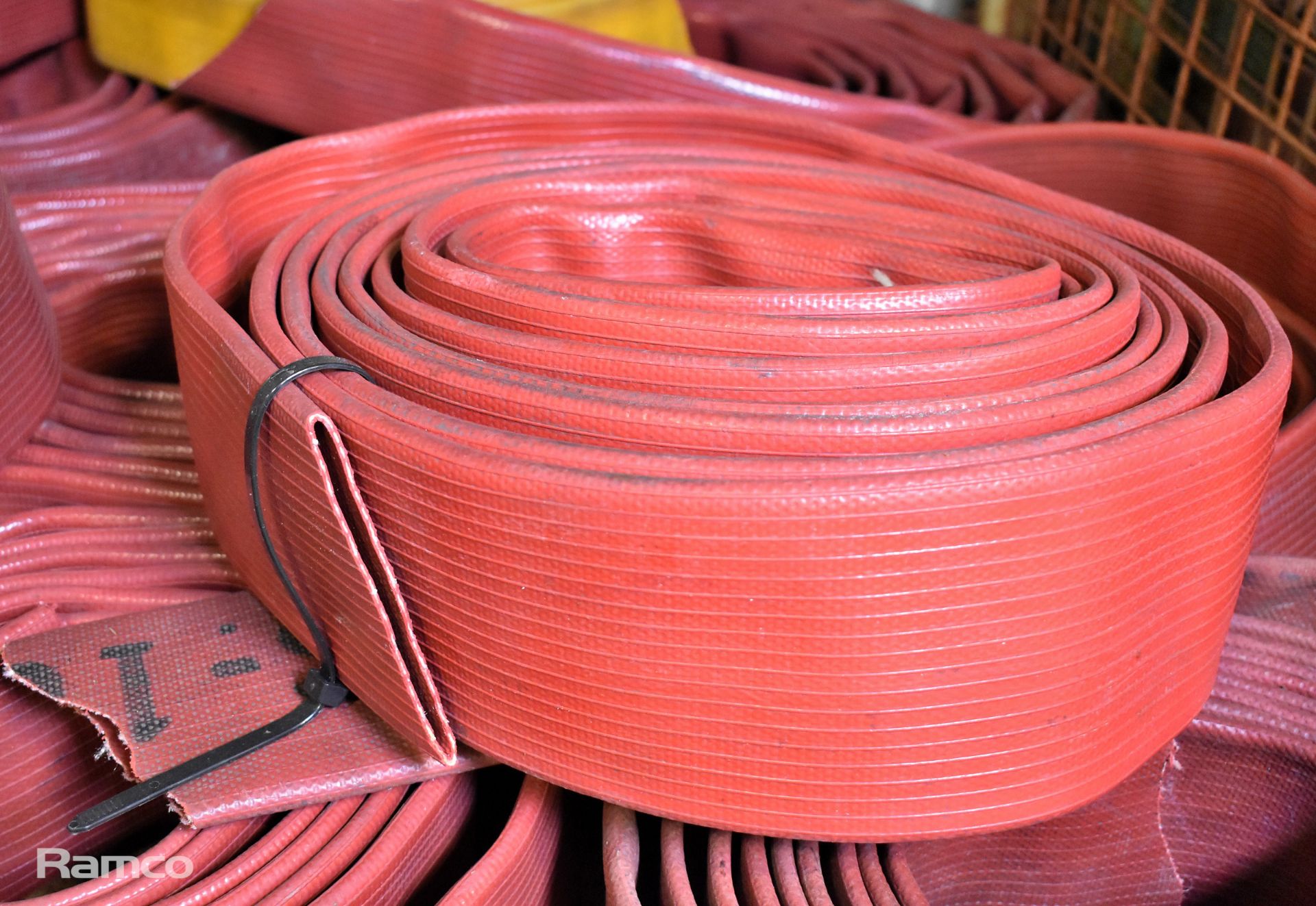 12x red layflat fire hoses - mixed sizes - some missing couplings - Image 2 of 2
