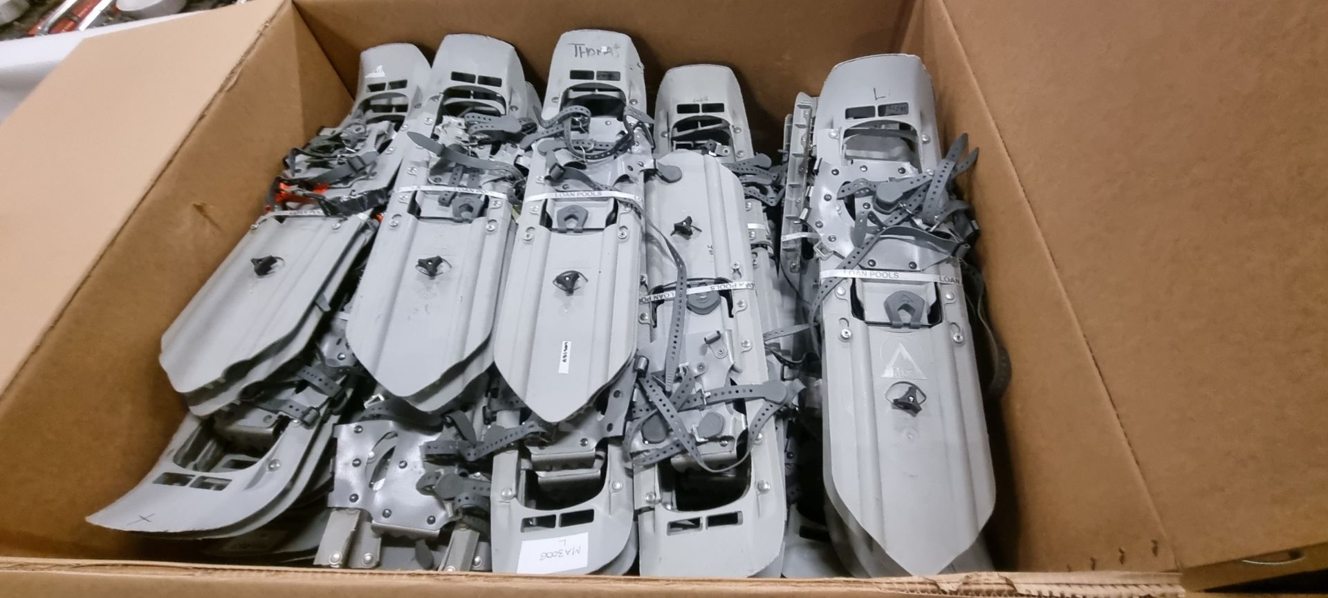 Grey plastic snowshoes - approx 40 pairs