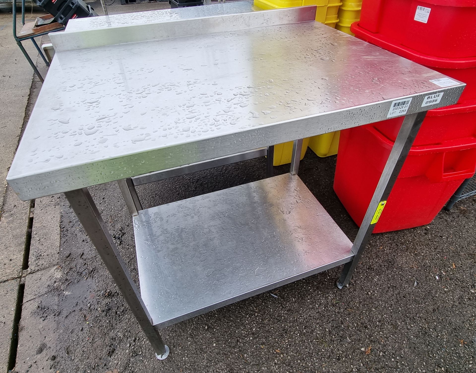 Stainless steel table with bottom shelf and upstand - dimensions: 90 x 65 x 95cm