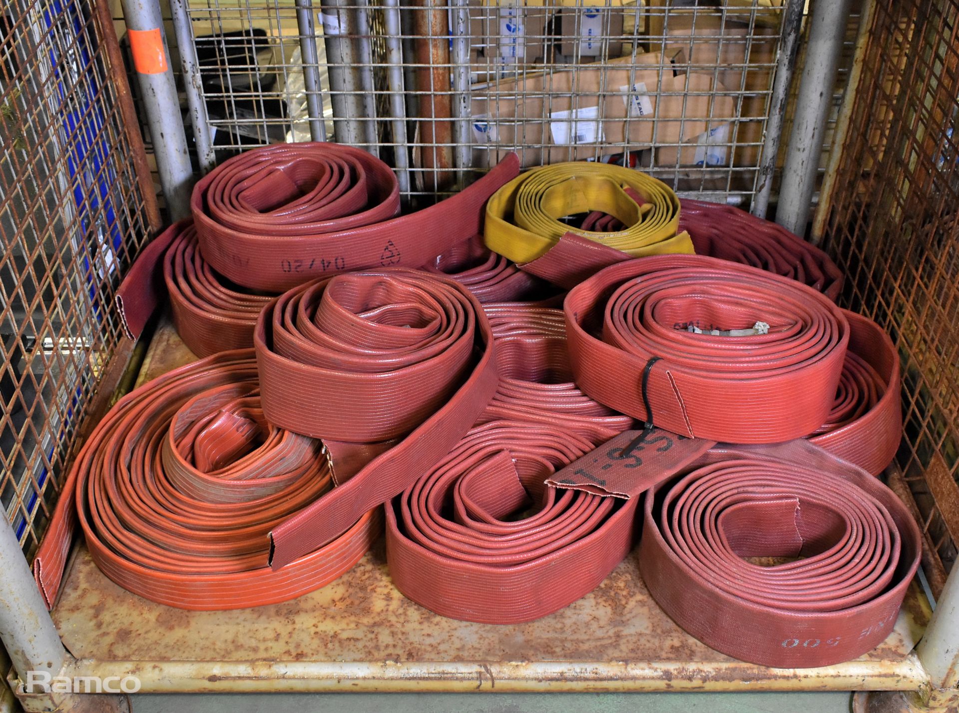 12x red layflat fire hoses - mixed sizes - some missing couplings
