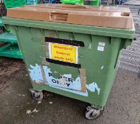 Large green plastic wheelie bin - dimensions: 120 x 100 x 130cm - brown lid