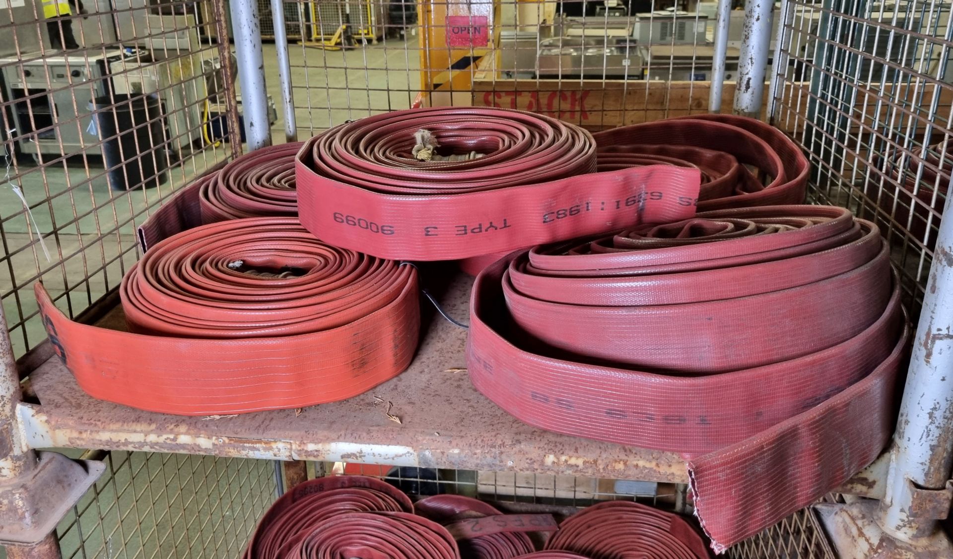 4x Red layflat fire hoses - 70mm diameter, approx 20m length