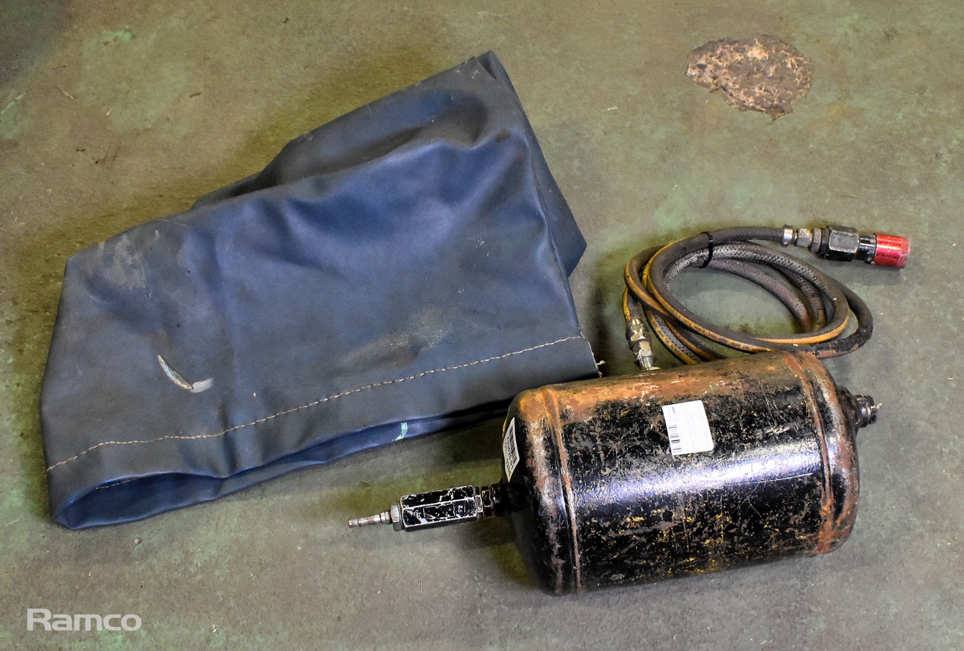 Small metal pressure cylinder with storage bag