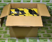 2x boxes of Black and yellow hazard tape - 12 rolls per box