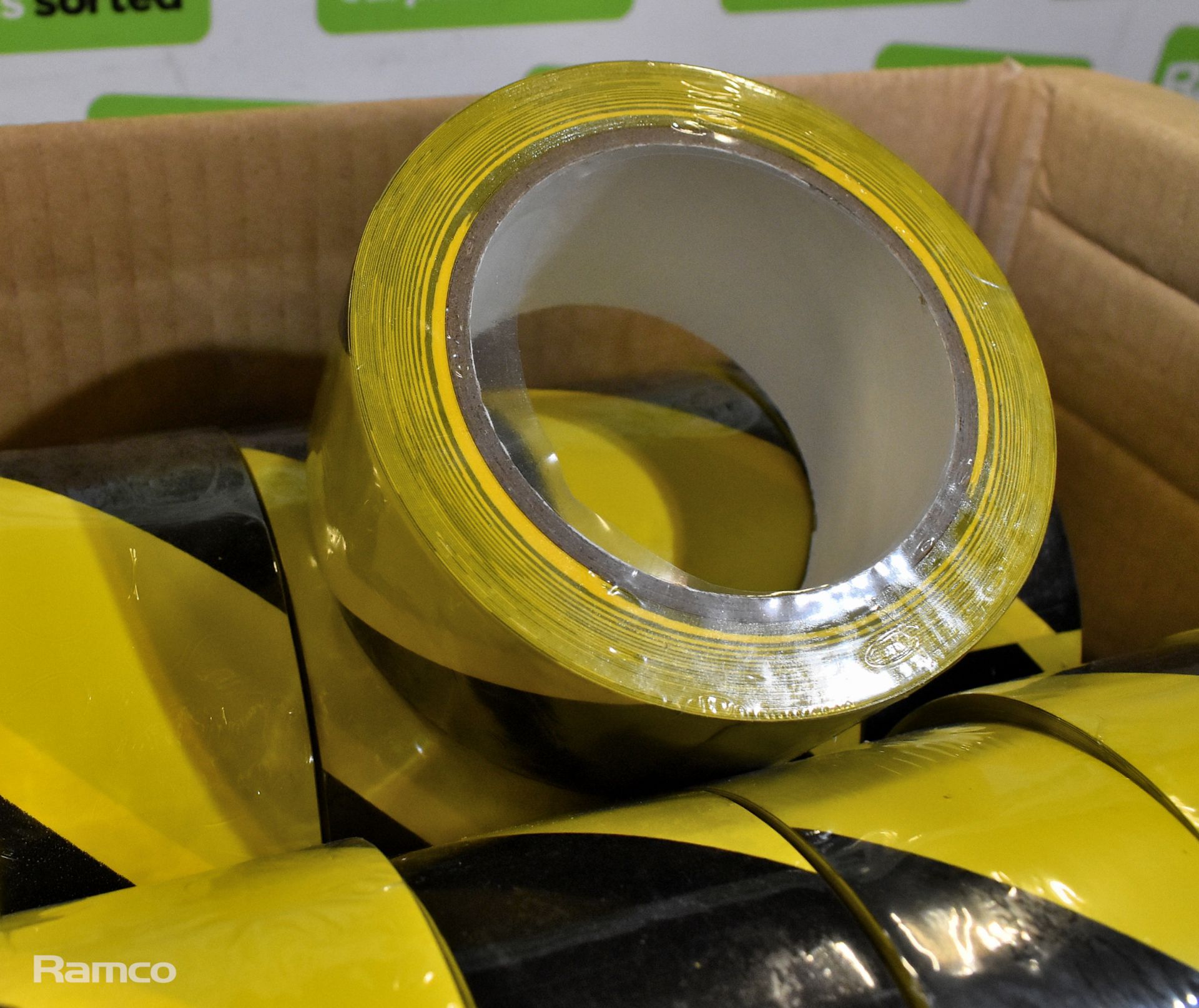 2x boxes of Black and yellow hazard tape - 12 rolls per box - Image 3 of 4