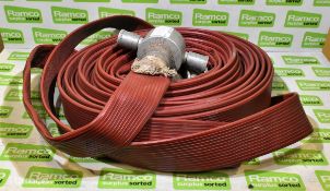 Layflat hose with couplings - approx. 15-20m long each (70cm diameter coiled)