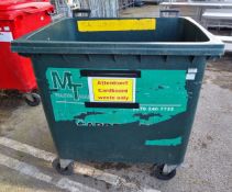 Large green plastic wheelie bin (no lid) - dimensions: 120 x 100 x 130cm