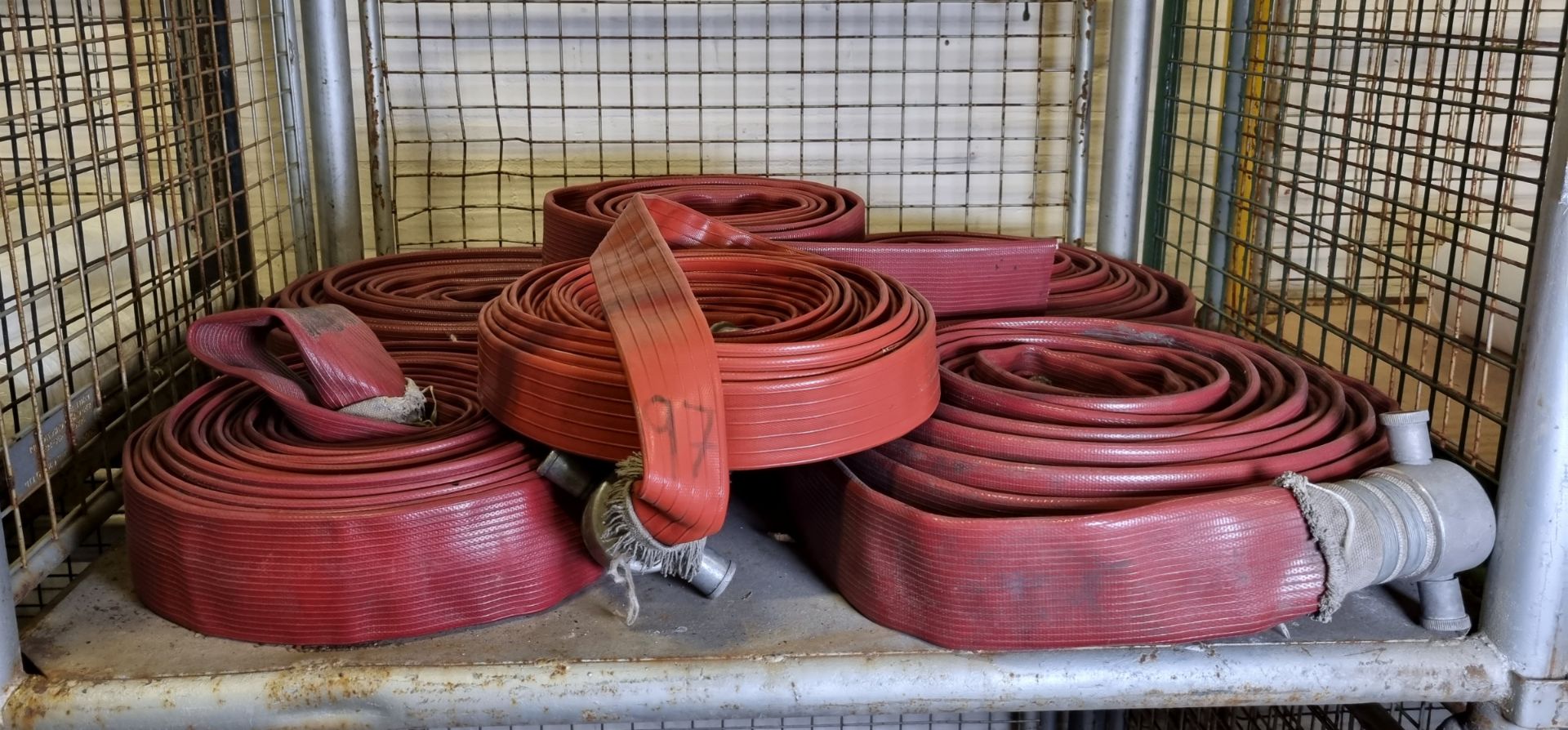 6x red layflat fire hose, mixed sizes, some missing couplings