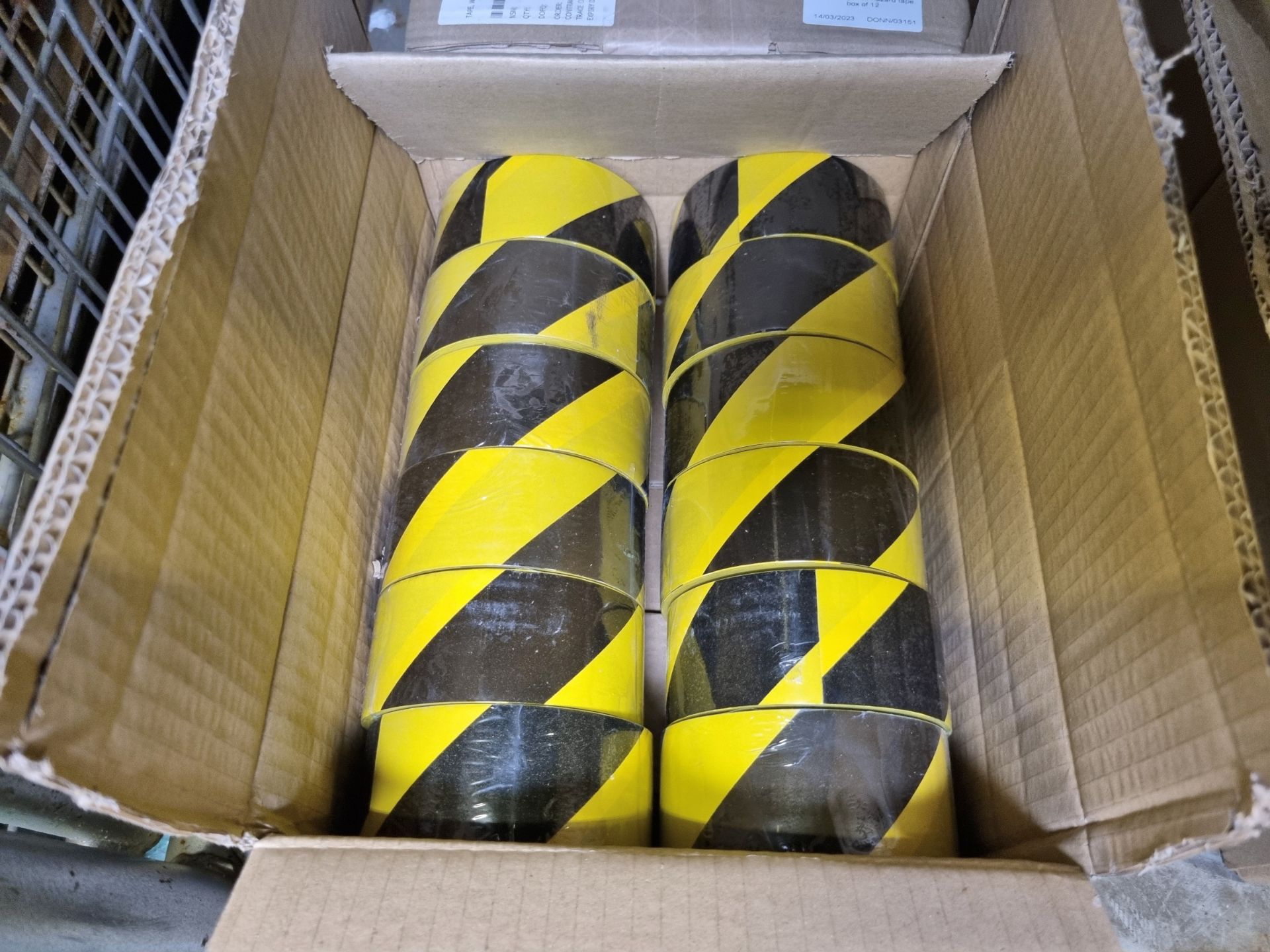 3x boxes of Black and yellow hazard tape - 12 rolls per box - Image 3 of 4