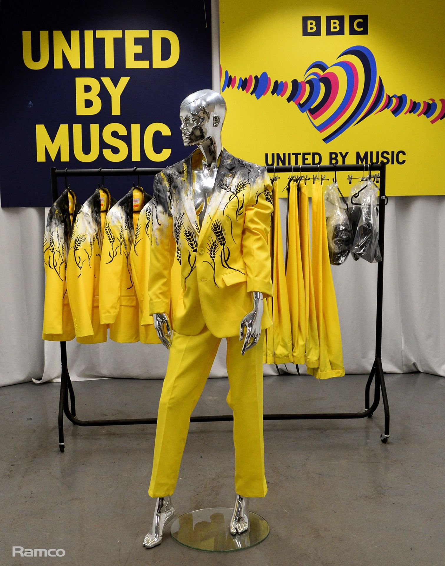 Yellow Outfits worn by backing dancers during the United by Music performance by Mariya Yaremchuck
