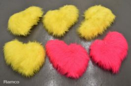 2x pink & 4x yellow heart shaped cushions used on presenters' sofas