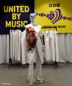 White Outfits worn by backing dancers during the United by Music performance by Mariya Yaremchuck