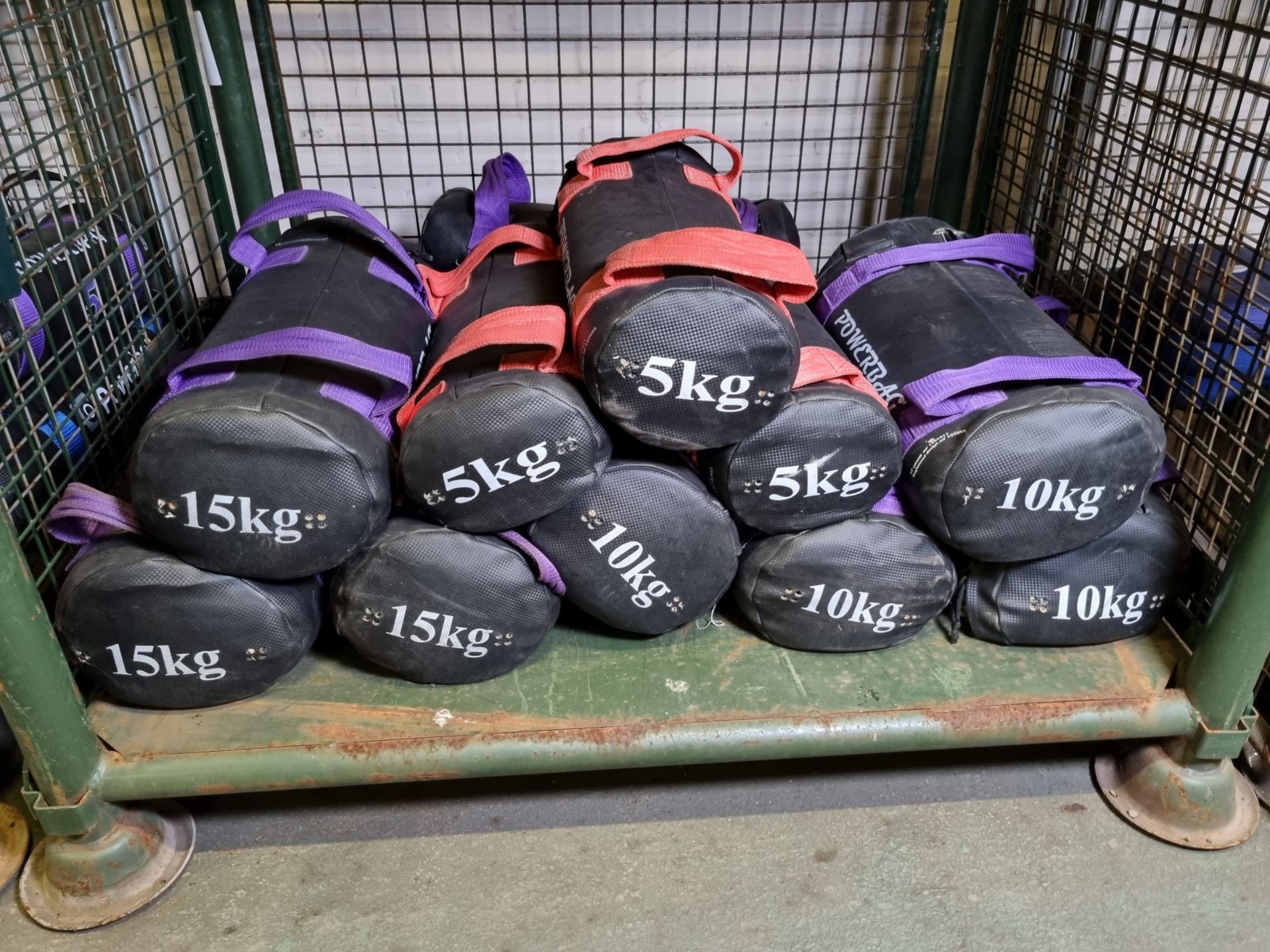 13x exercise powerbags - 3x 5kg, 7x 10kg, 3x 15kg