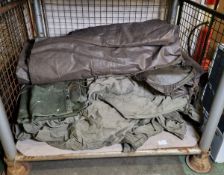 Assorted army bags, canvas and tent trailer cover