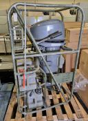 Mariner 20 - 20Hp Outboard motor Serial no OC195434 in travel cage with Barrus 5L fuel tank