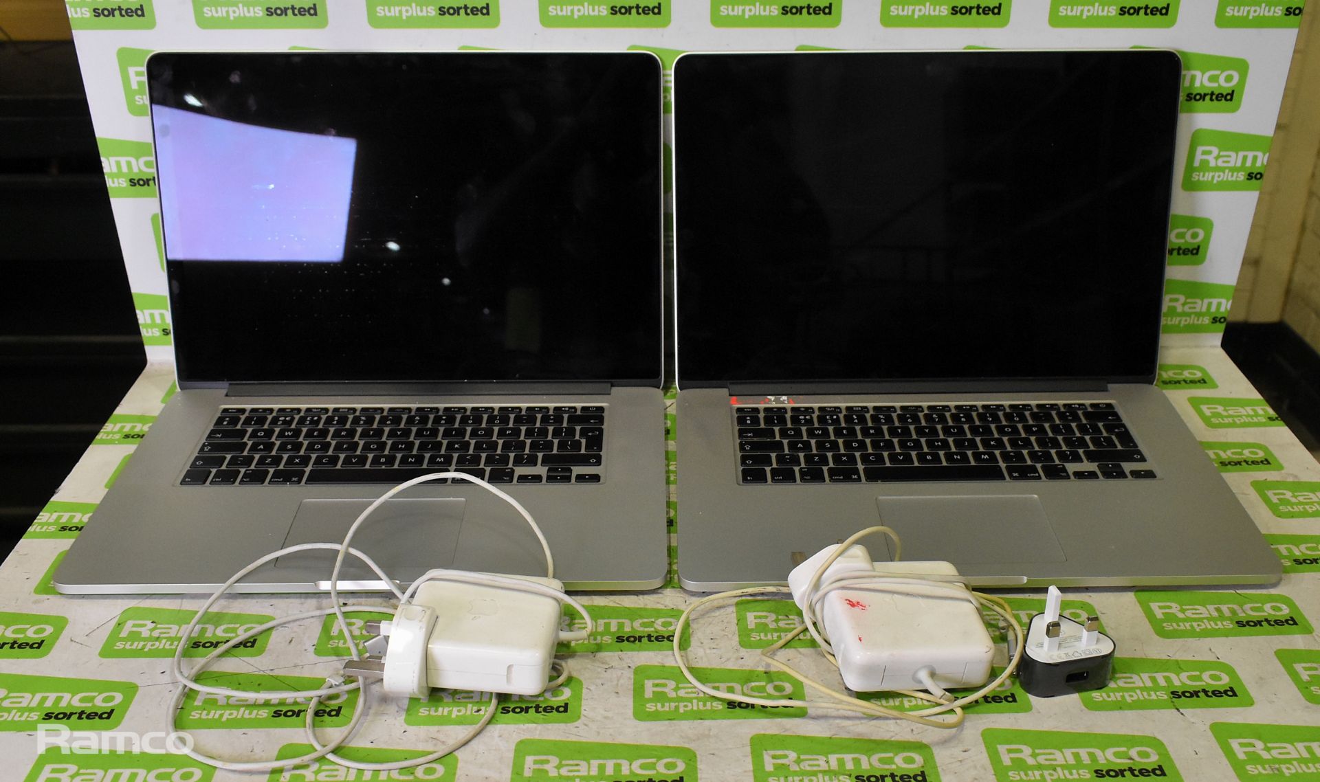 2x 2015 15 inch Apple Macbook Pros - model number A1398 - chargers included