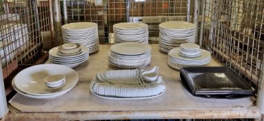Catering equipment - plates and bowls of multiple shapes and sizes and rice spoons
