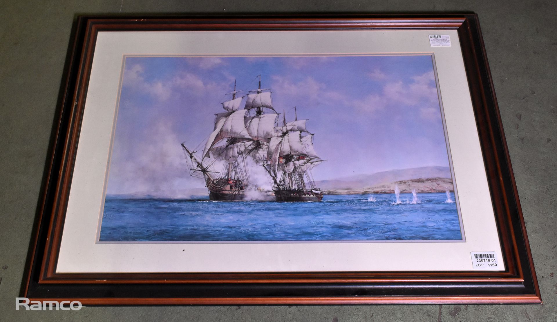 Framed print of painting depicting a ship battle (believed to be HMS Victory)