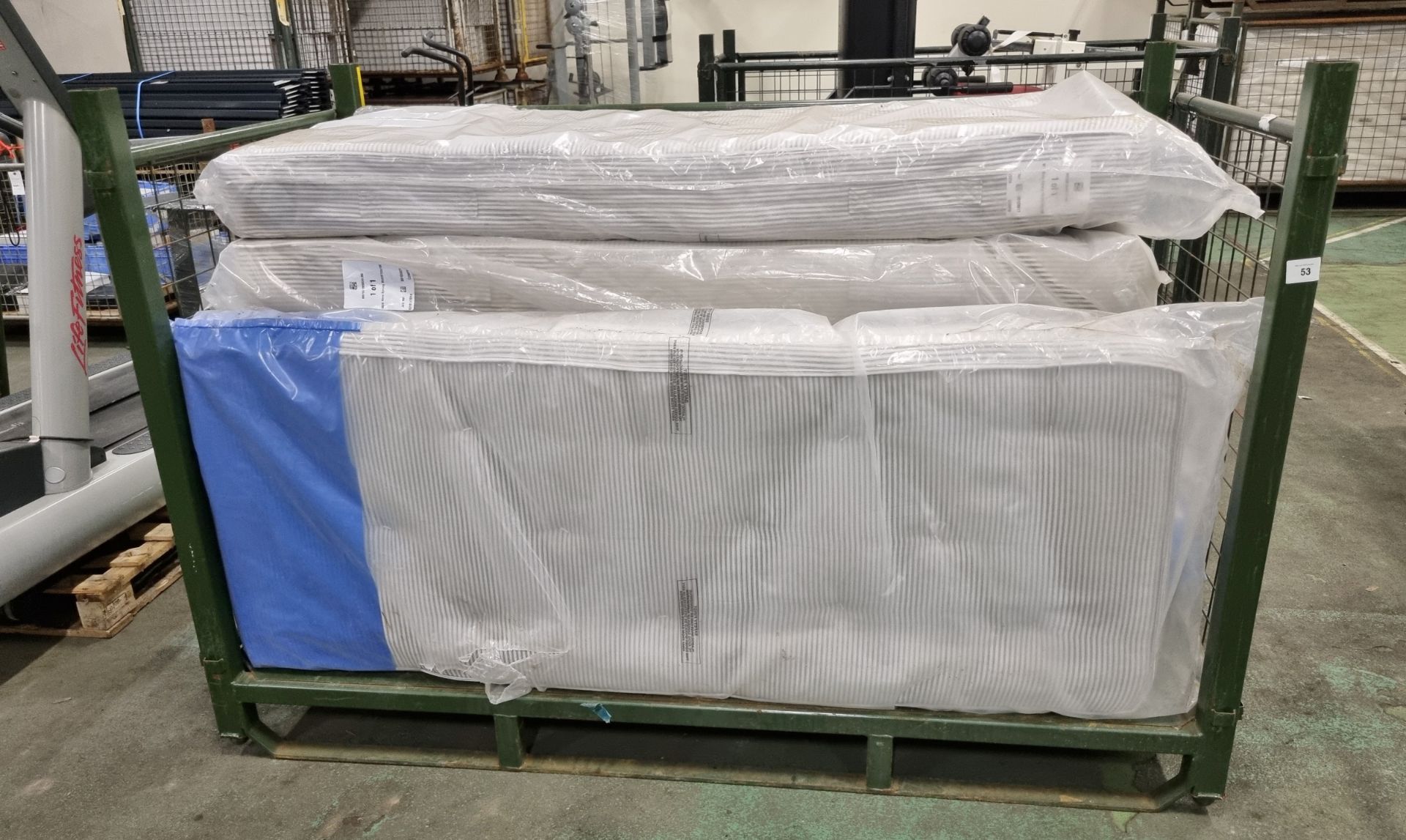 7x Black & white open coil single mattresses - discoloured due to being in storage