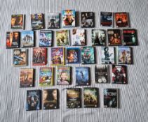 33x DVDs to include Paranormal activity, Sucker punch, Venom 2 let there be carnage & more