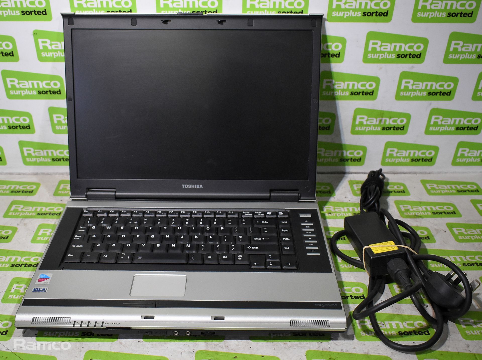 Toshiba Equium M70-337 laptop with power leads