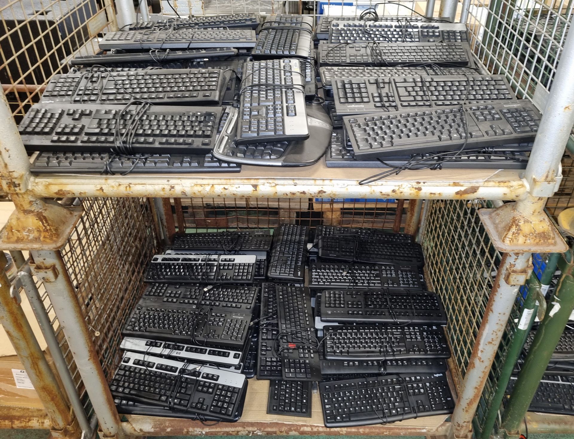 90x computer keyboards of multiple makes - HP, Logitech and Kensington