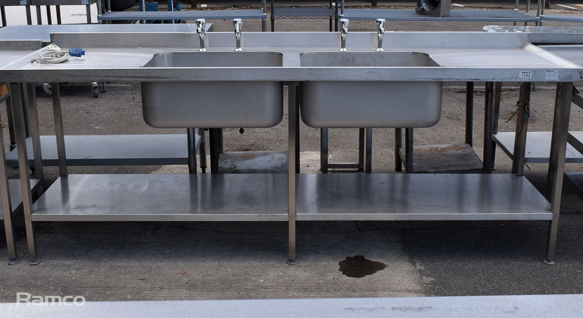 Stainless steel large double sink unit with lower shelf - W 2400 x D 650 x H 1030mm
