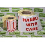 Roll of handle with care stickers - unknown quantity - sticker size: 200 x 150mm