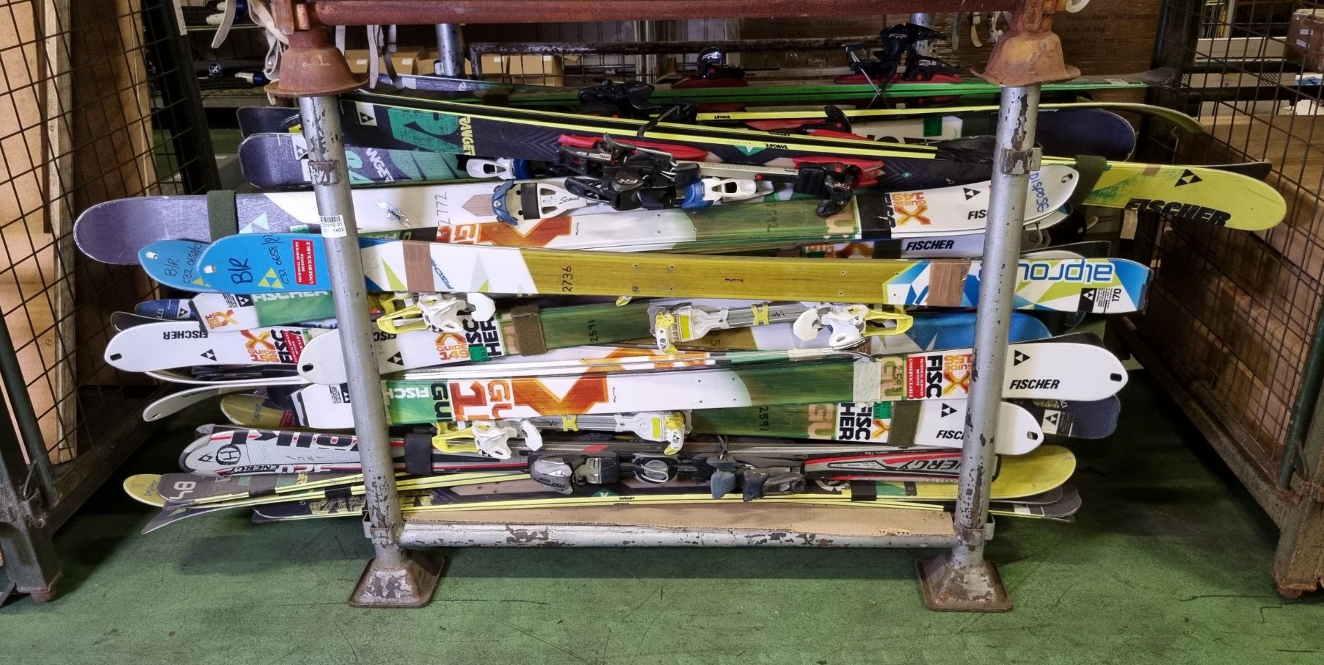 Downhill skis various sizes and models with and without bindings - approx 50 pairs