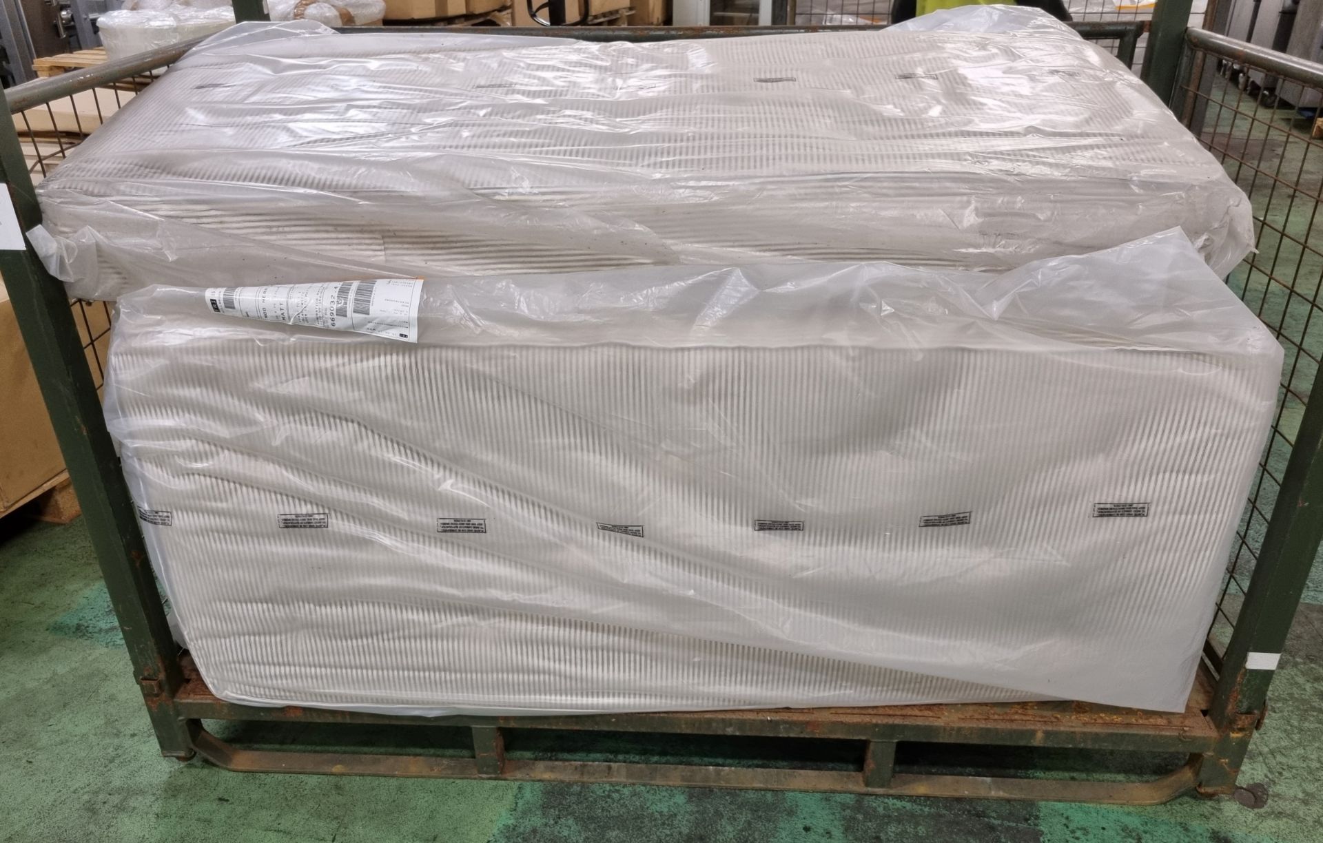 7x Black & white open coil single mattresses - discoloured due to being in storage