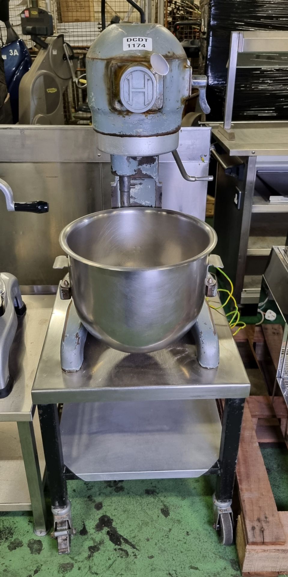 Hobart AE200 freestanding mixer on small stainless steel table with castors