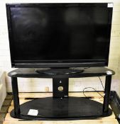 Hitachi L42VC04U H 42 inch LCD TV - NO REMOTE, Black semi circle TV stand with glass top and middle