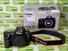 Canon EOS SD Mark IV(WG) digital camera and charger