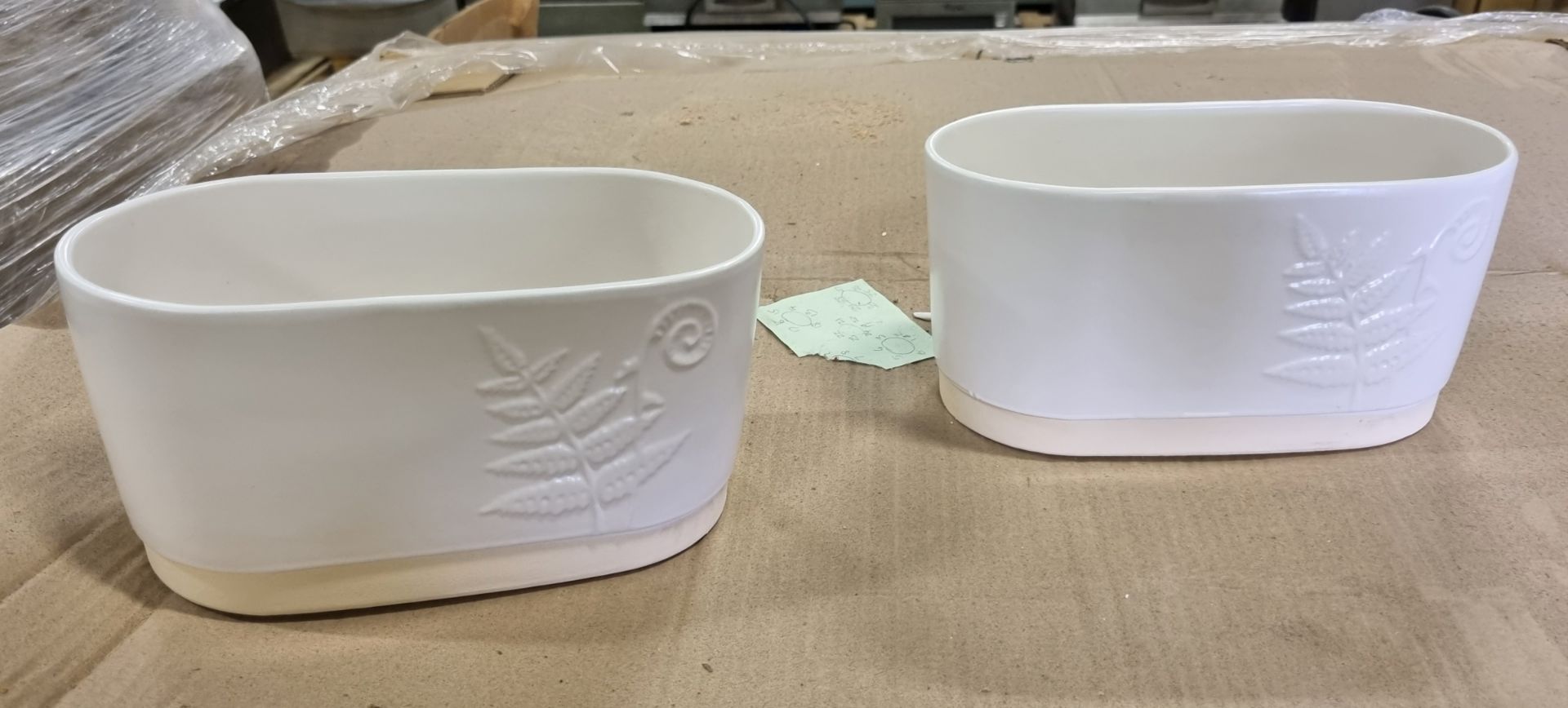 Approximately 250 white ceramic oval plant pots - on original pallet - SOME BROKEN - Image 2 of 3